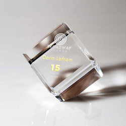 Elegant optical crystal awards with custom sandblast engraving for corporate excellence and employee appreciation.
