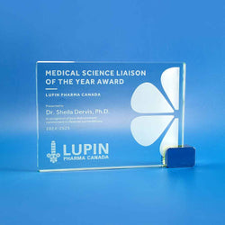 Contemporary jade, clear, and coloured glass awards with custom sandblast engraving for corporate excellence trophies. North American Handcrafted